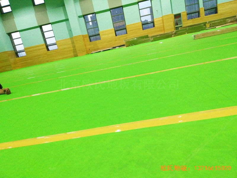 武漢廣阜屯小學清江錦城分校籃球館運動地板施工案例3